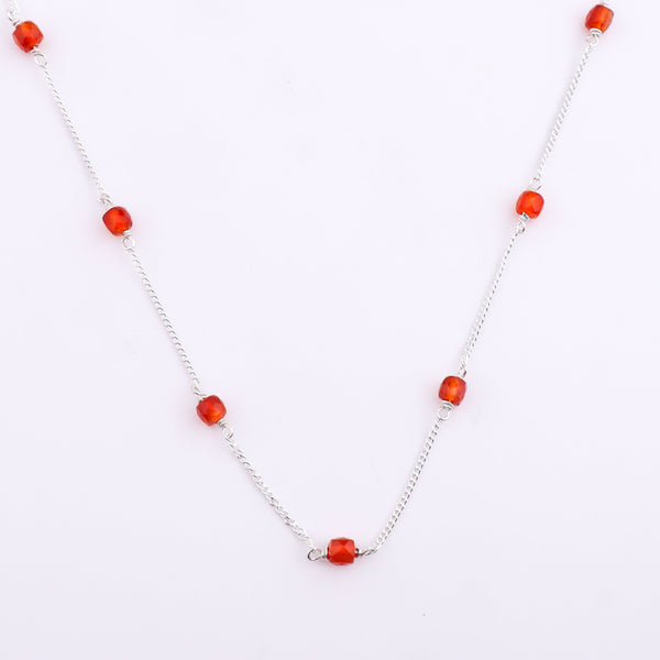 Silver chain with orange beads