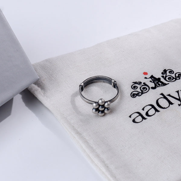 Sterling silver ring with Kudi motif and cluster of silver beads