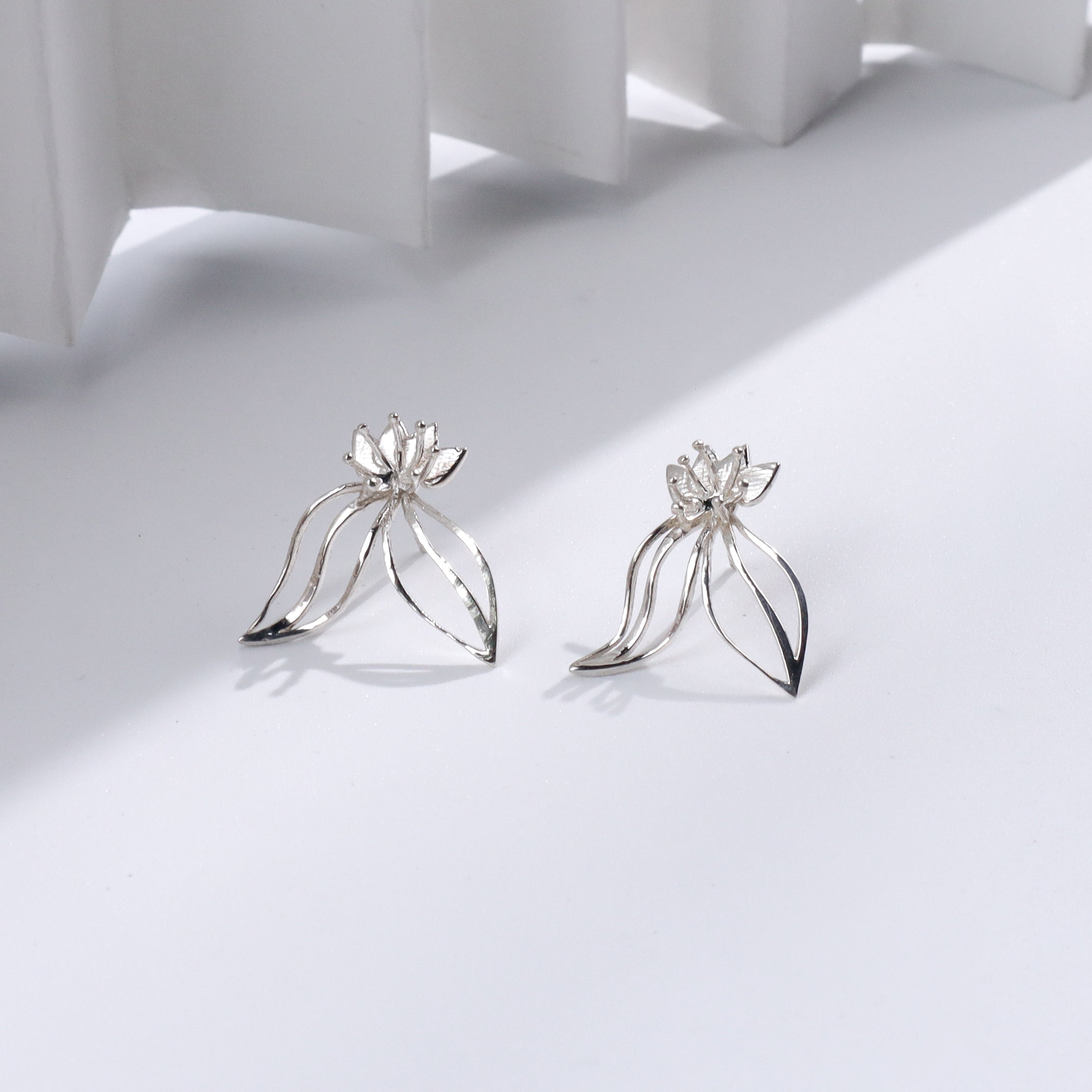 Silver floral earrings for jewelry accessories