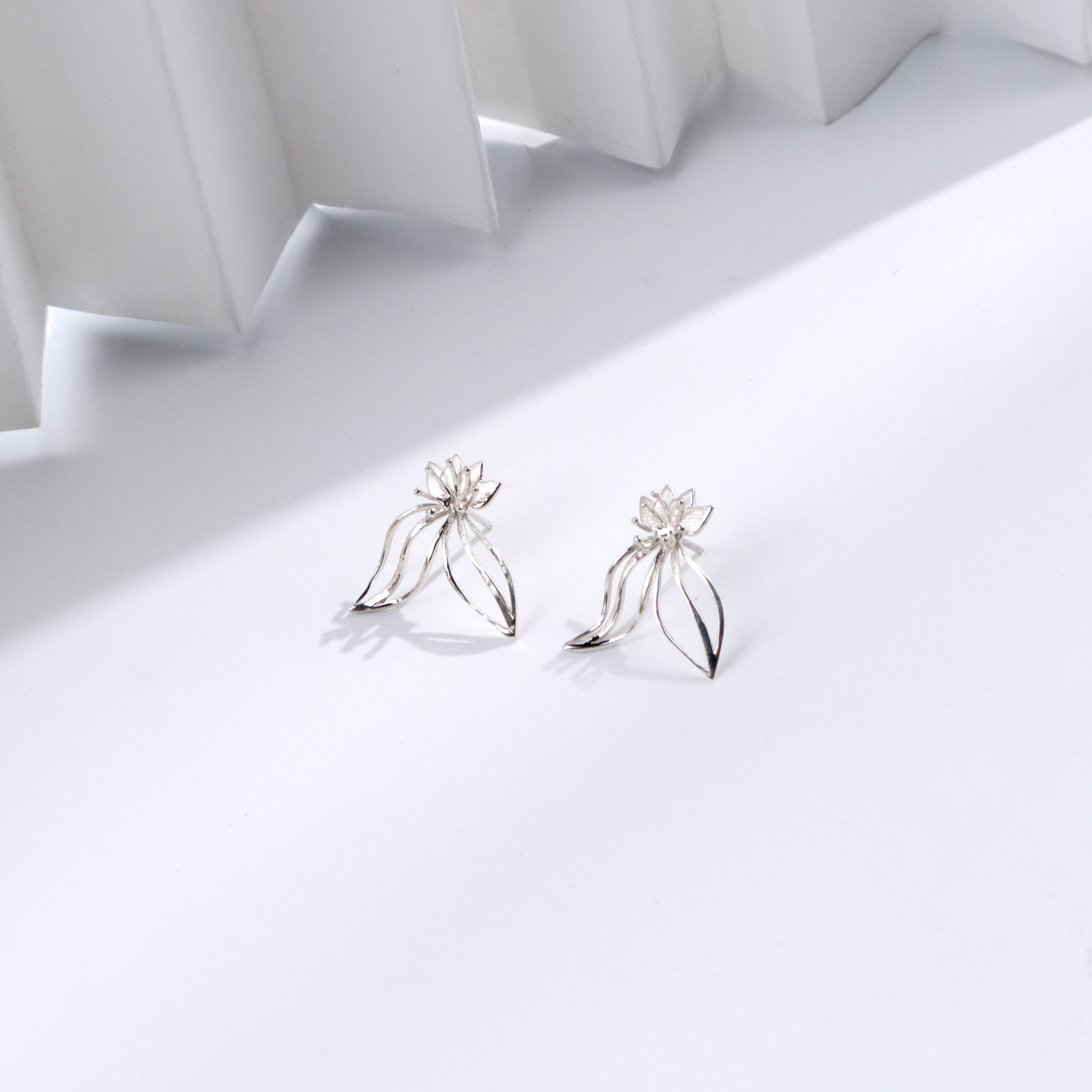 Silver floral earrings for jewelry accessories