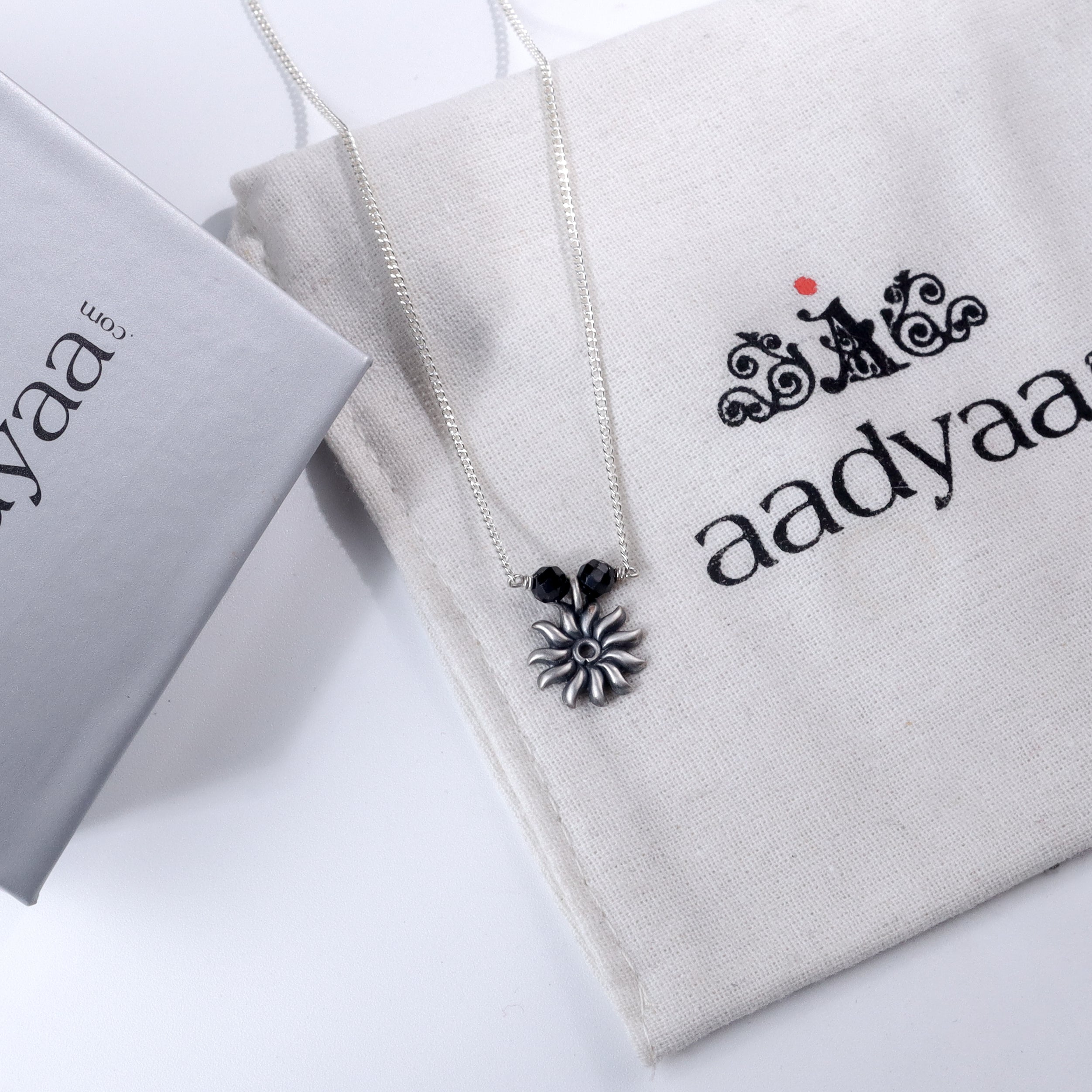 Sun Charm Mangalsutra with black beads and silver sun pendant