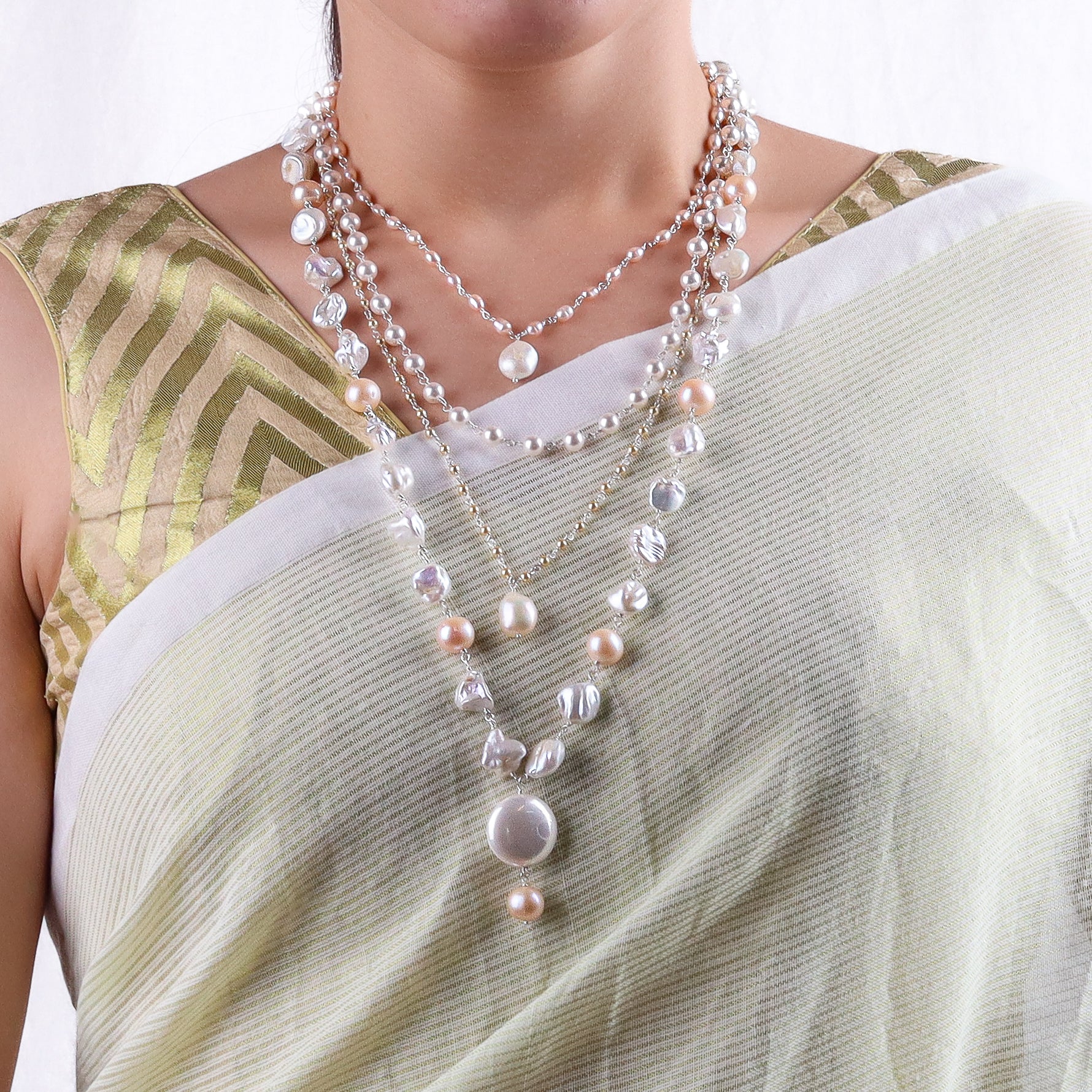 Mixed pearl silver necklace with freshwater baroque and rice pearls close-up