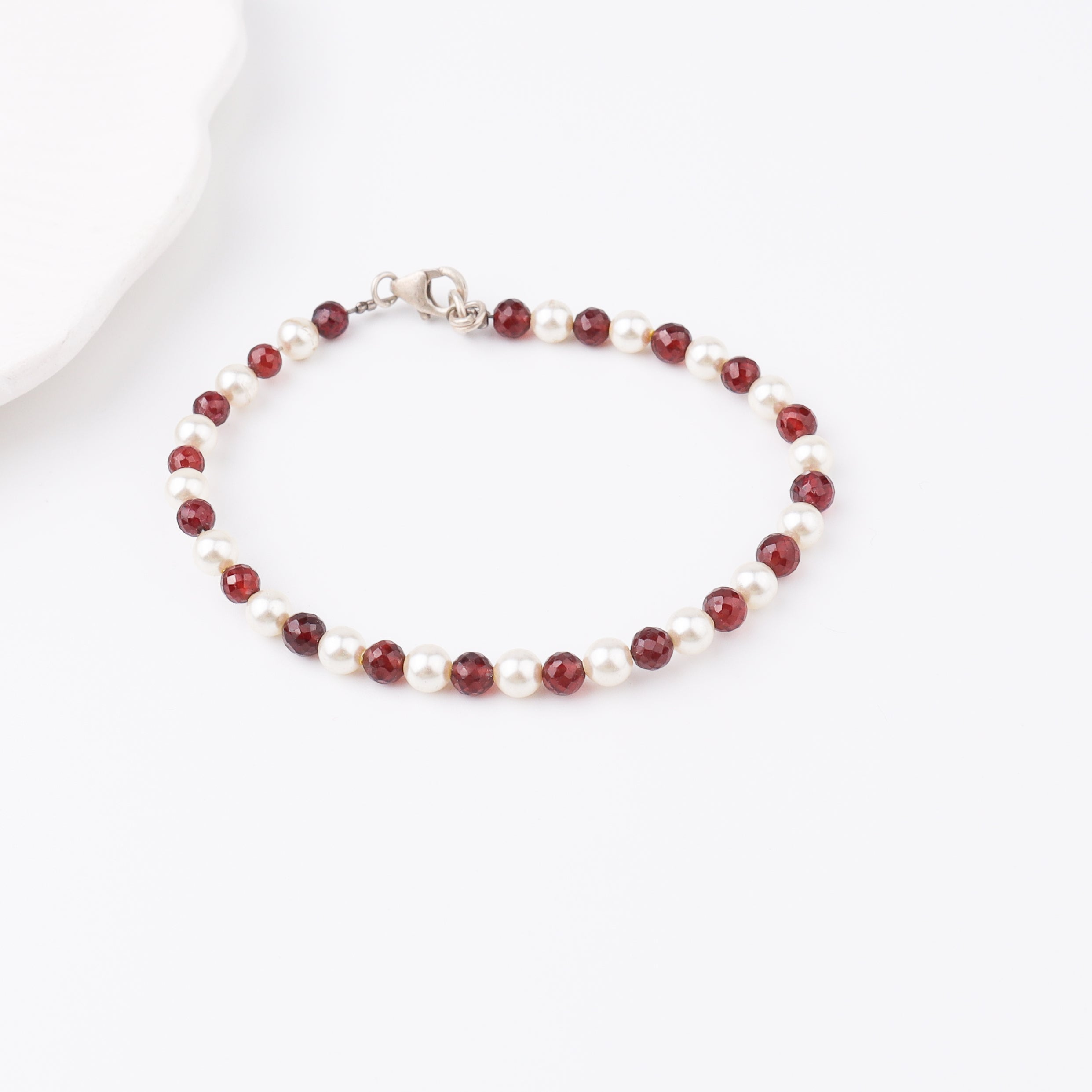 Semi precious stone bracelet in silver wire ( Garnet , Pearls )