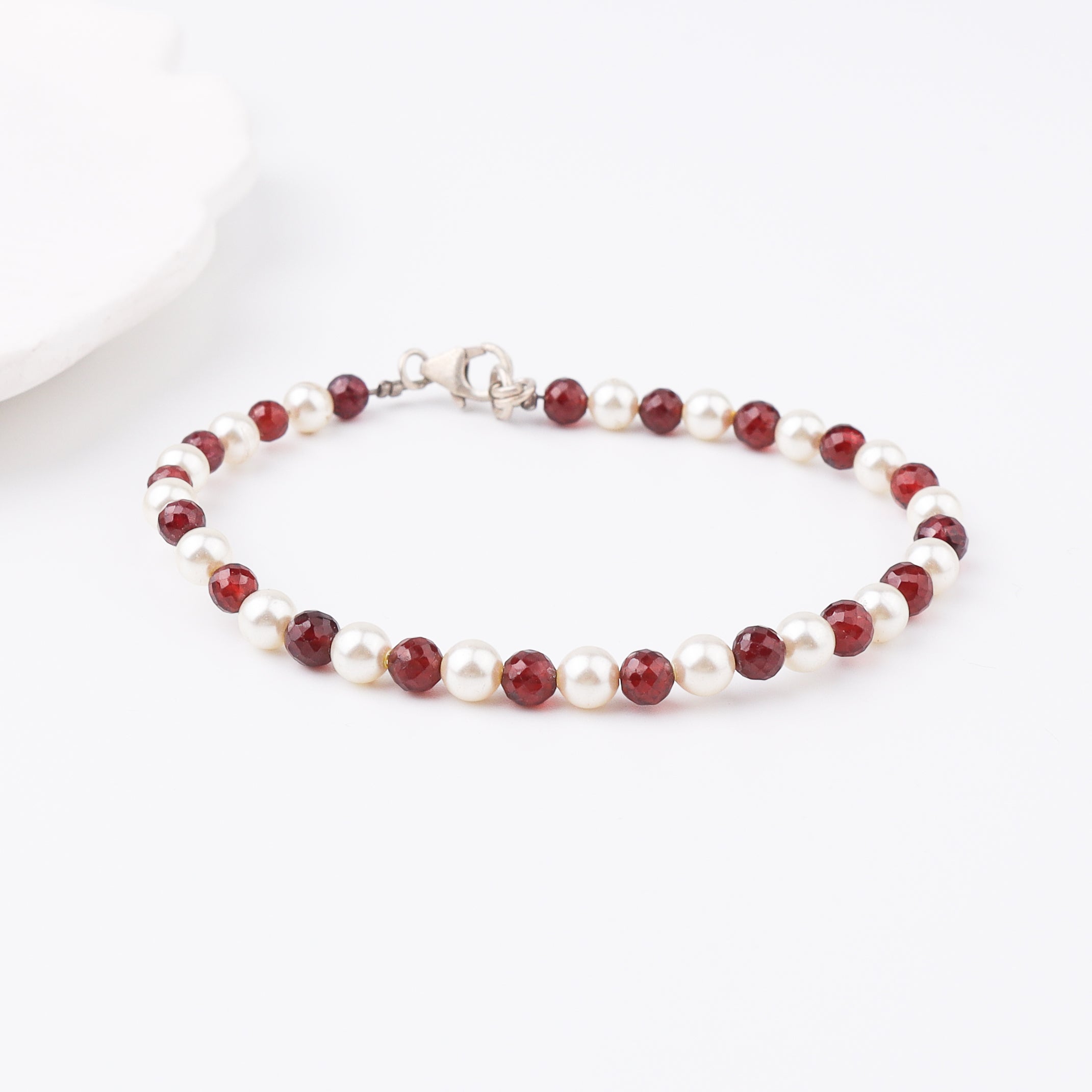 Semi precious stone bracelet in silver wire ( Garnet , Pearls )