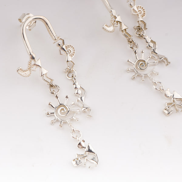 Silver earrings with Warli motifs and dance designs