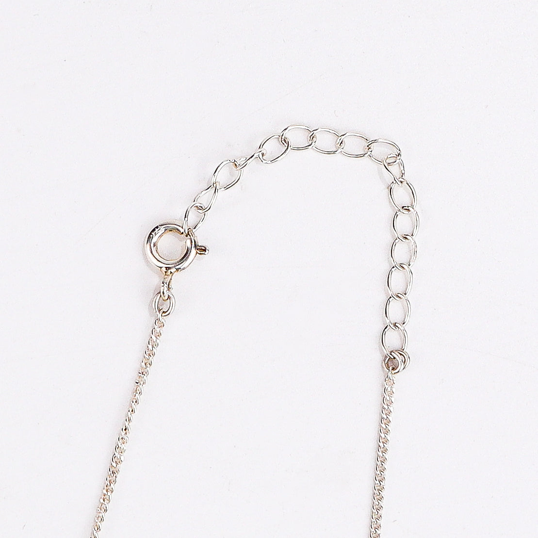 highlighting polished ghungroo and chain finish