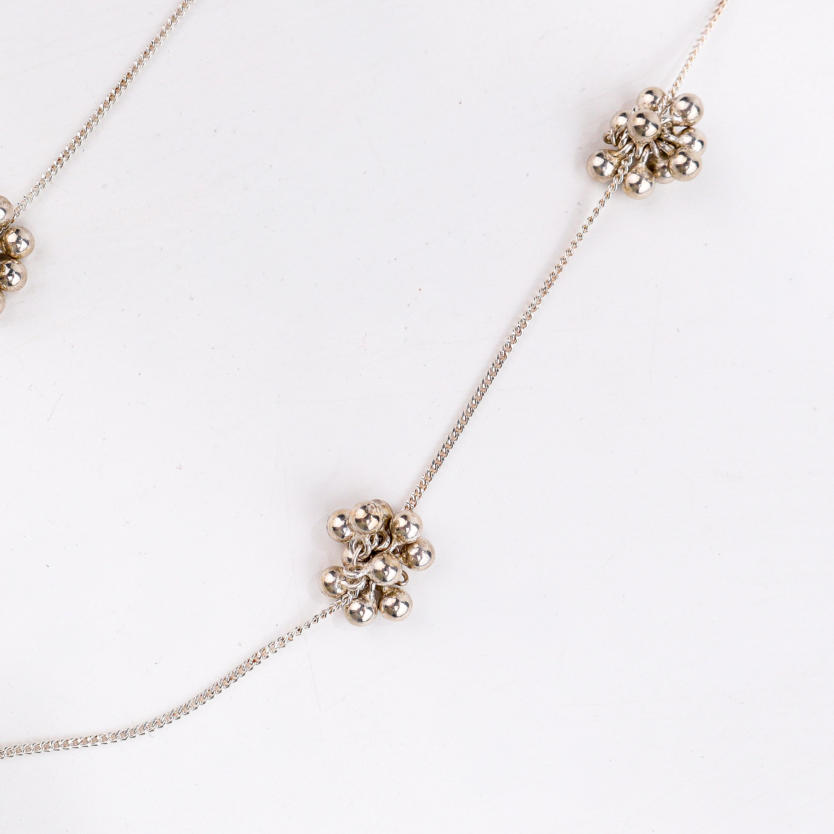 wear silver small ghungroo bunch chain for everyday styling