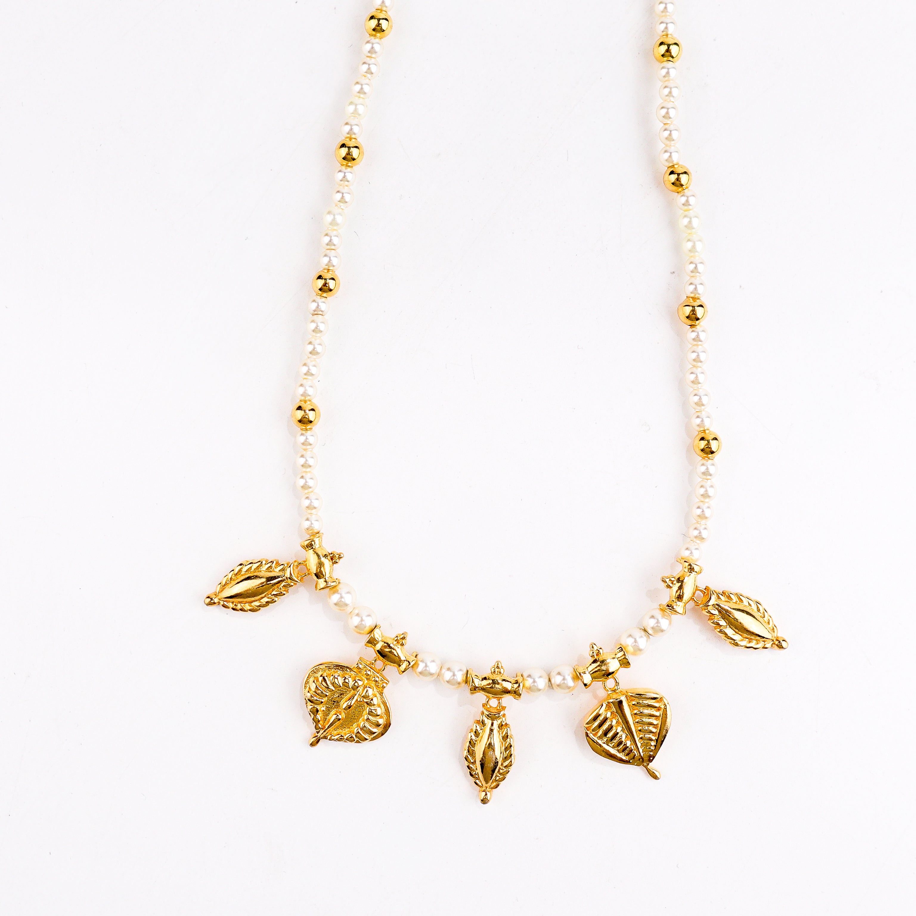 pearl necklace with gold plated motifs