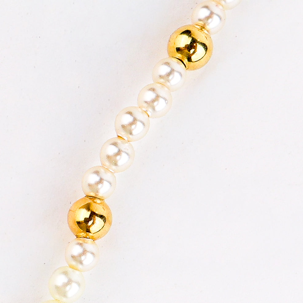 Silver bead pearl ganthan styled with saree and festive outfit