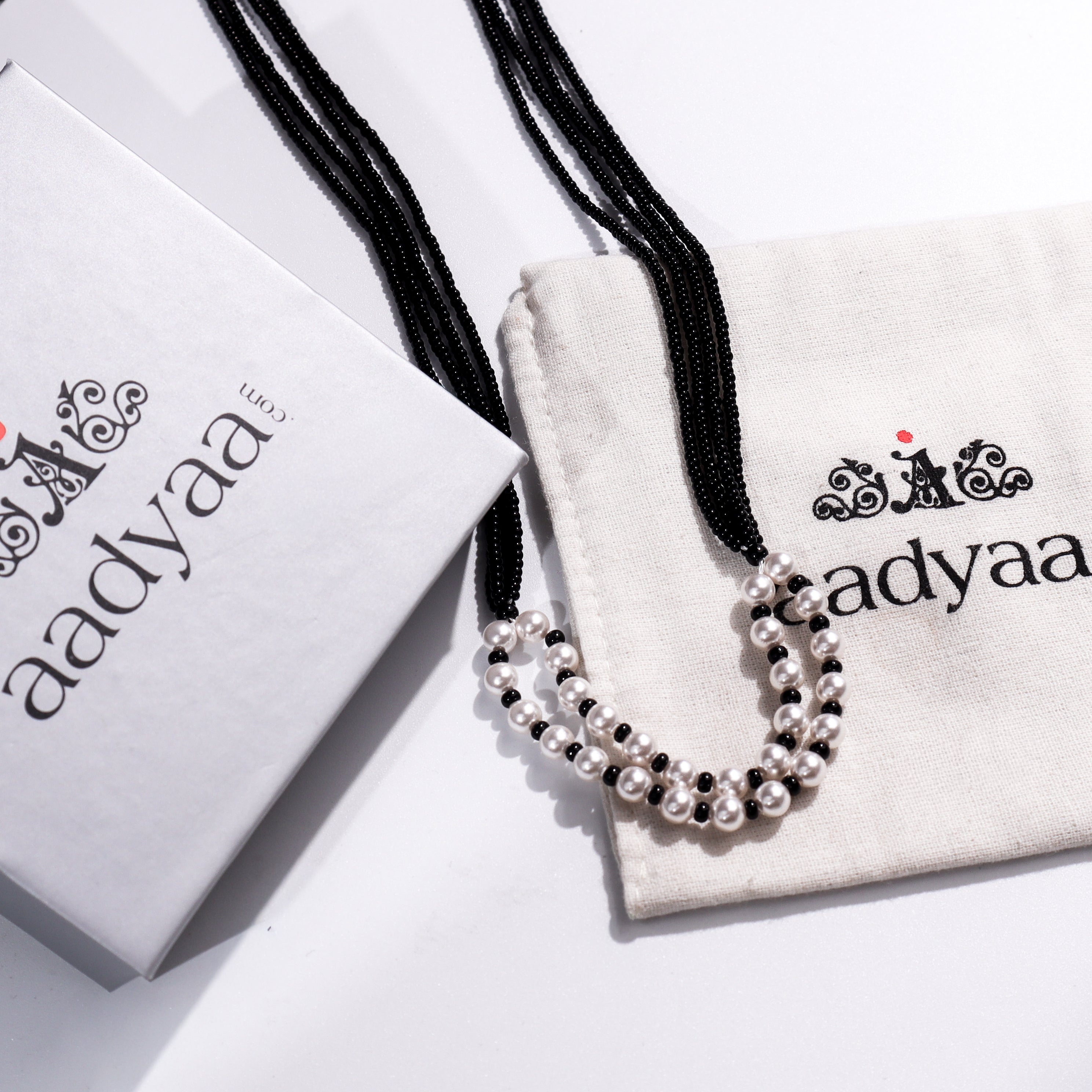 Pearl two layer mangalsutra with black beads and white pearls