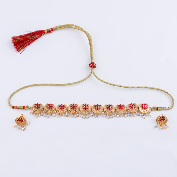 Gold and red enamel choker set with intricate design and pearl accents