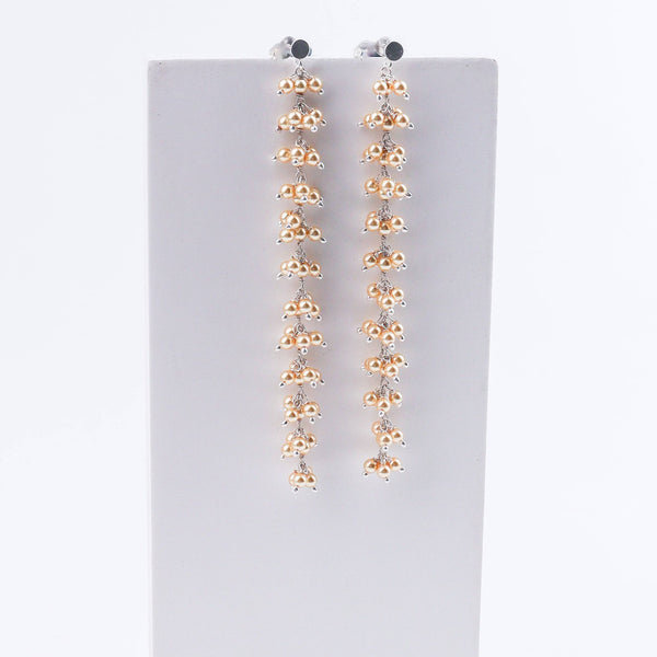 Elegant pearl earrings with gold and silver detailing