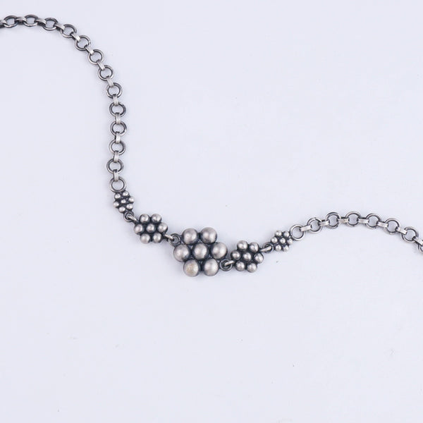 Sterling silver necklace with floral bead design