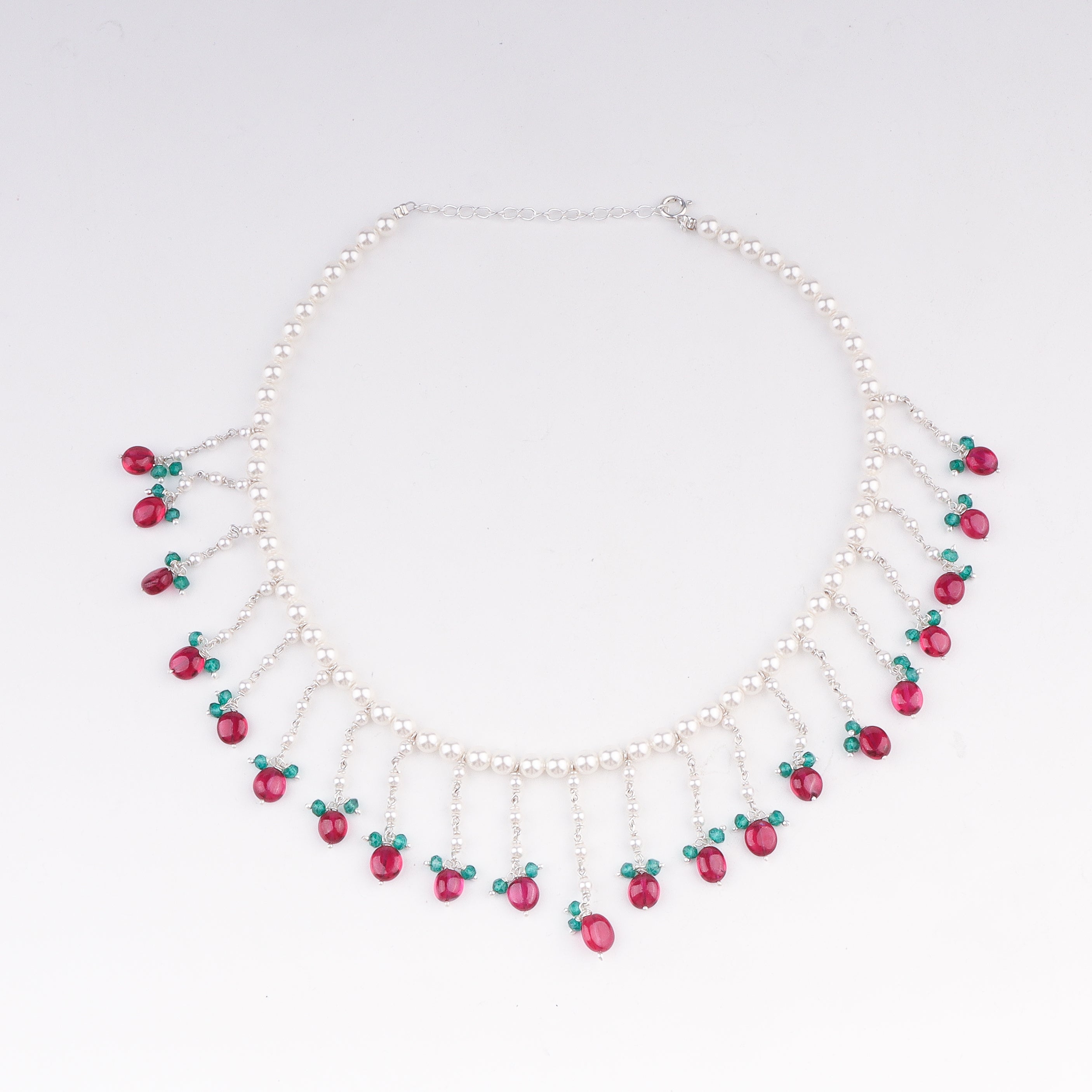 Pearl ruby green onyx silver necklace close-up handcrafted detailing