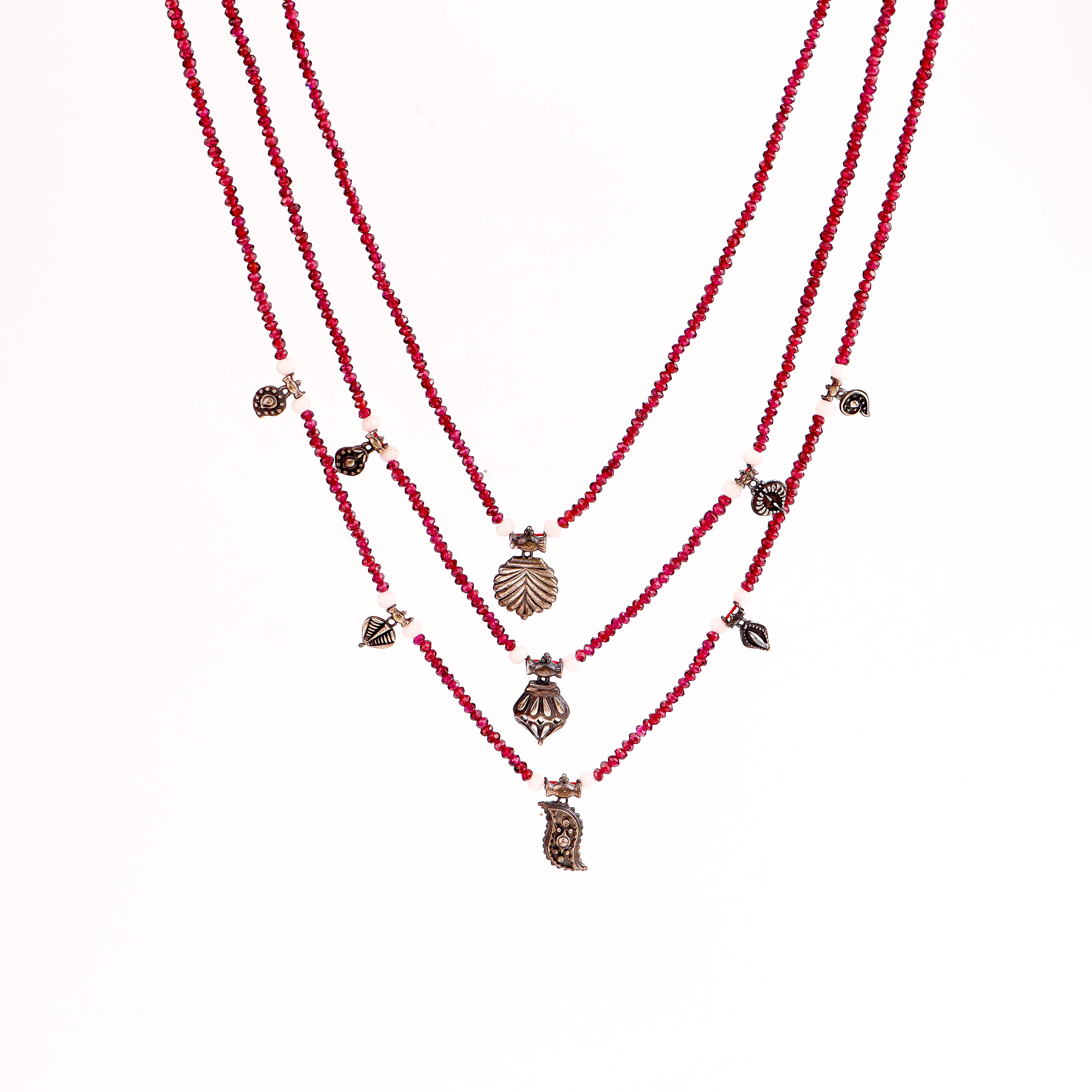 three layered satlada necklace with garnet stones