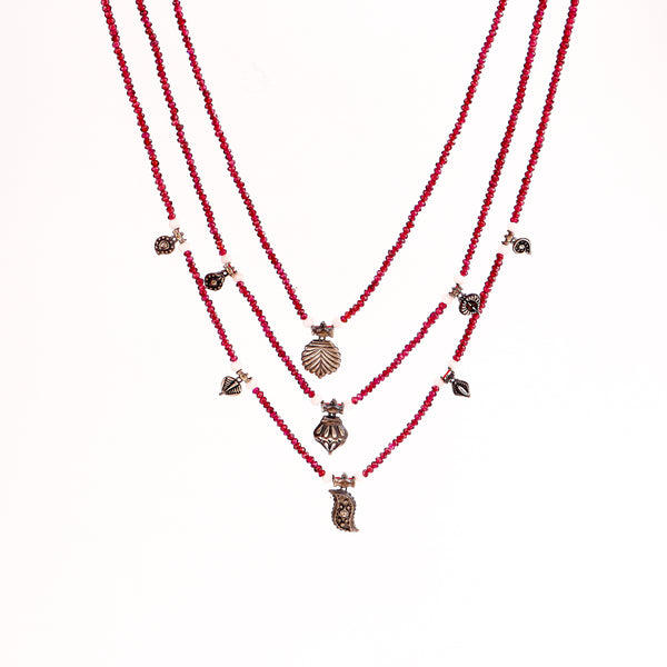 three layered satlada necklace with garnet stones