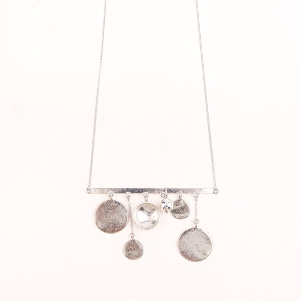 wear coin and vatee abstract necklace for modern styling