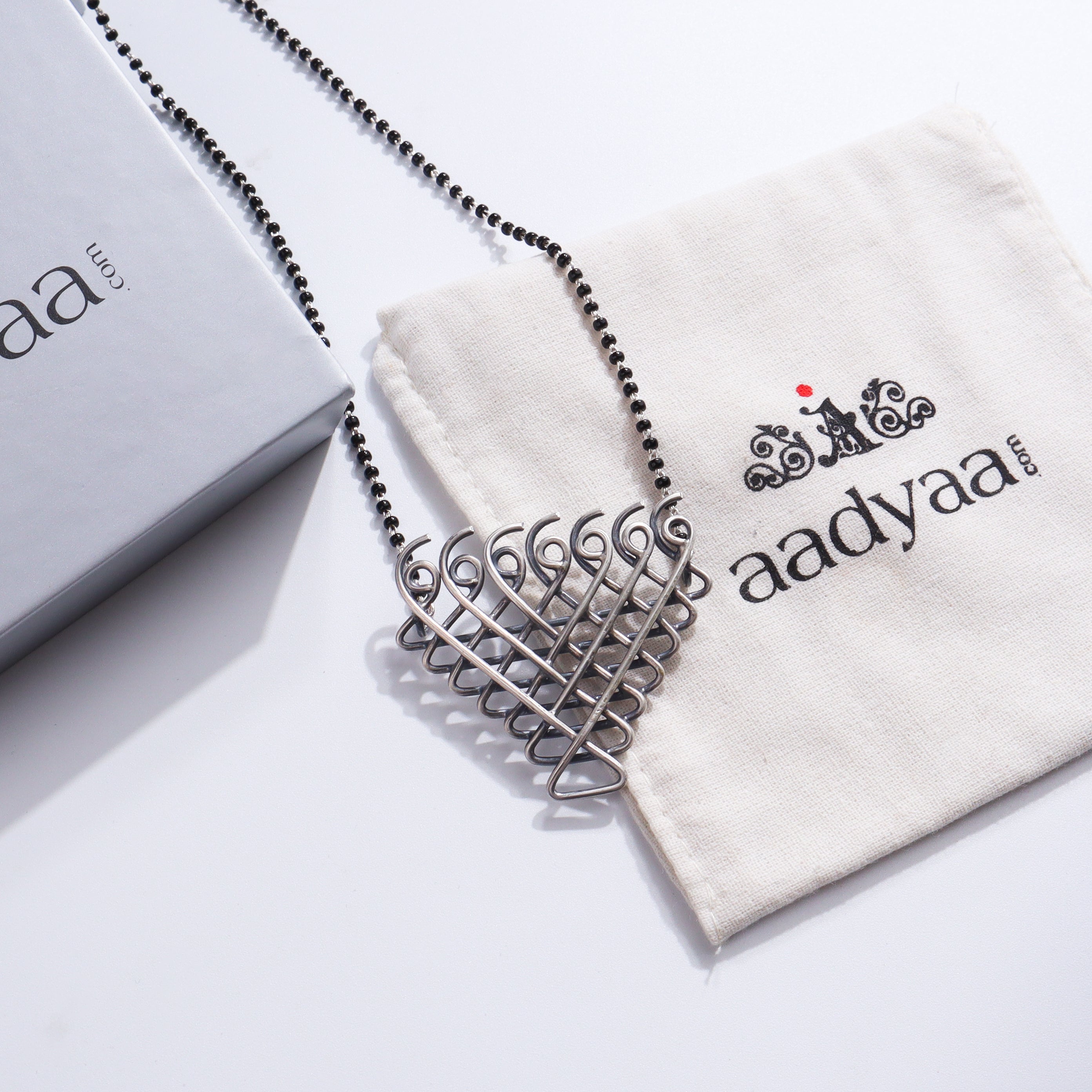 Silver Saraswati Mangalsutra with black beads and Saraswati pendant