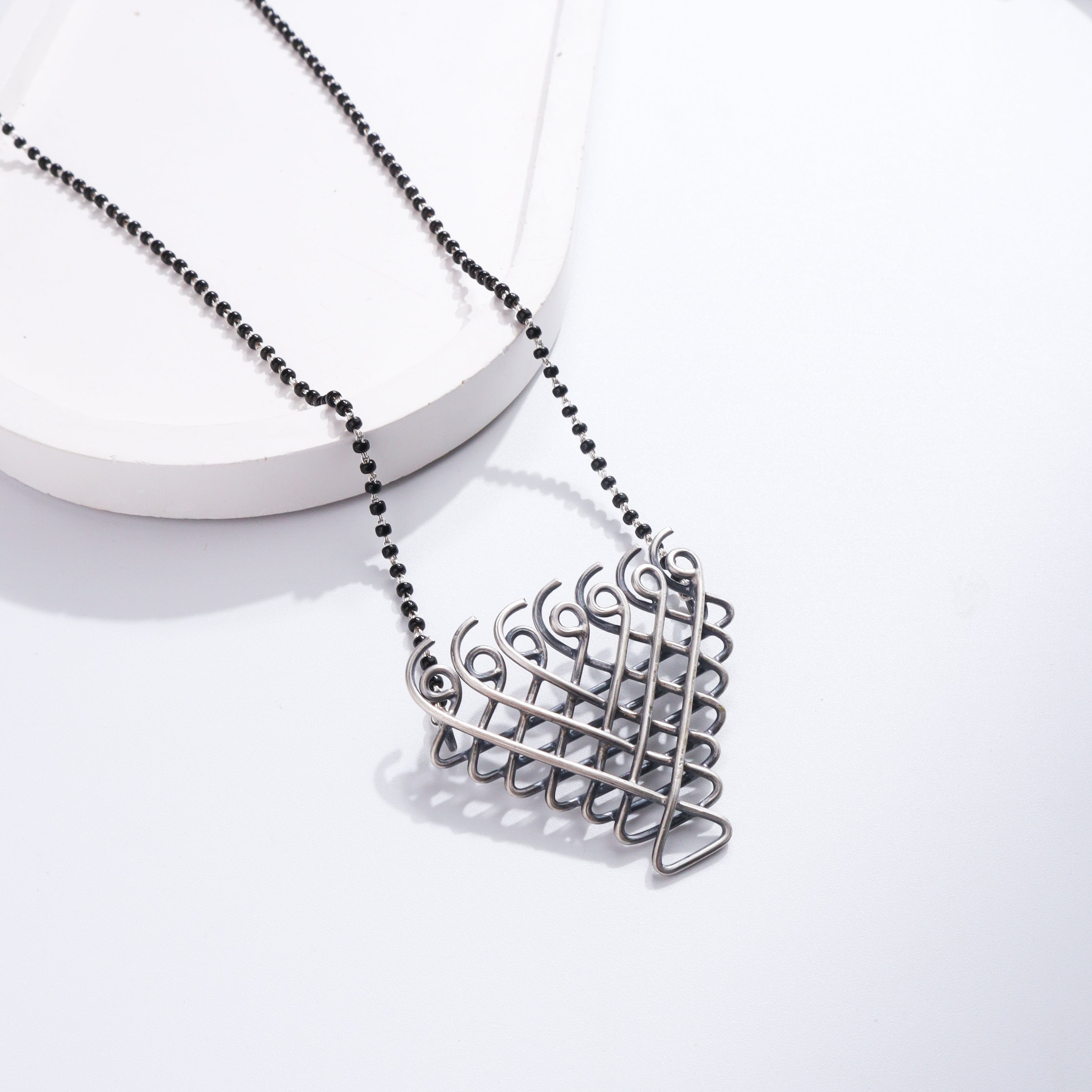 Silver Saraswati Mangalsutra with black beads and Saraswati pendant