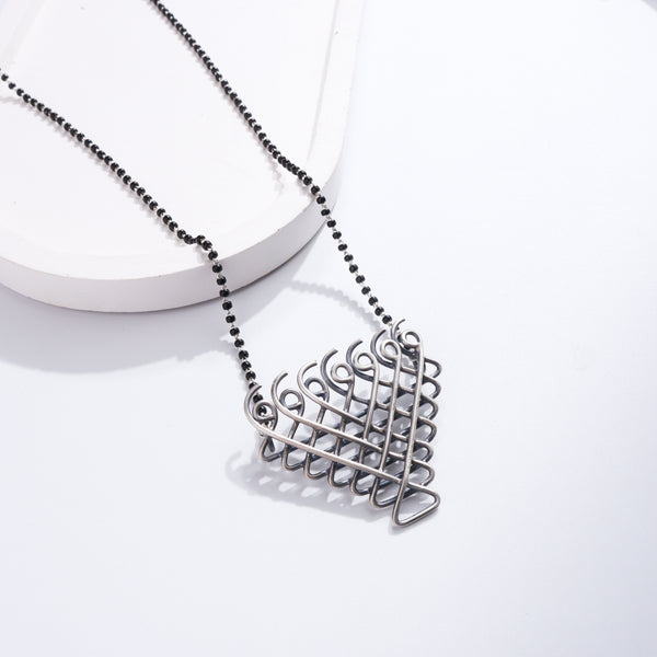 Silver Saraswati Mangalsutra with black beads and Saraswati pendant