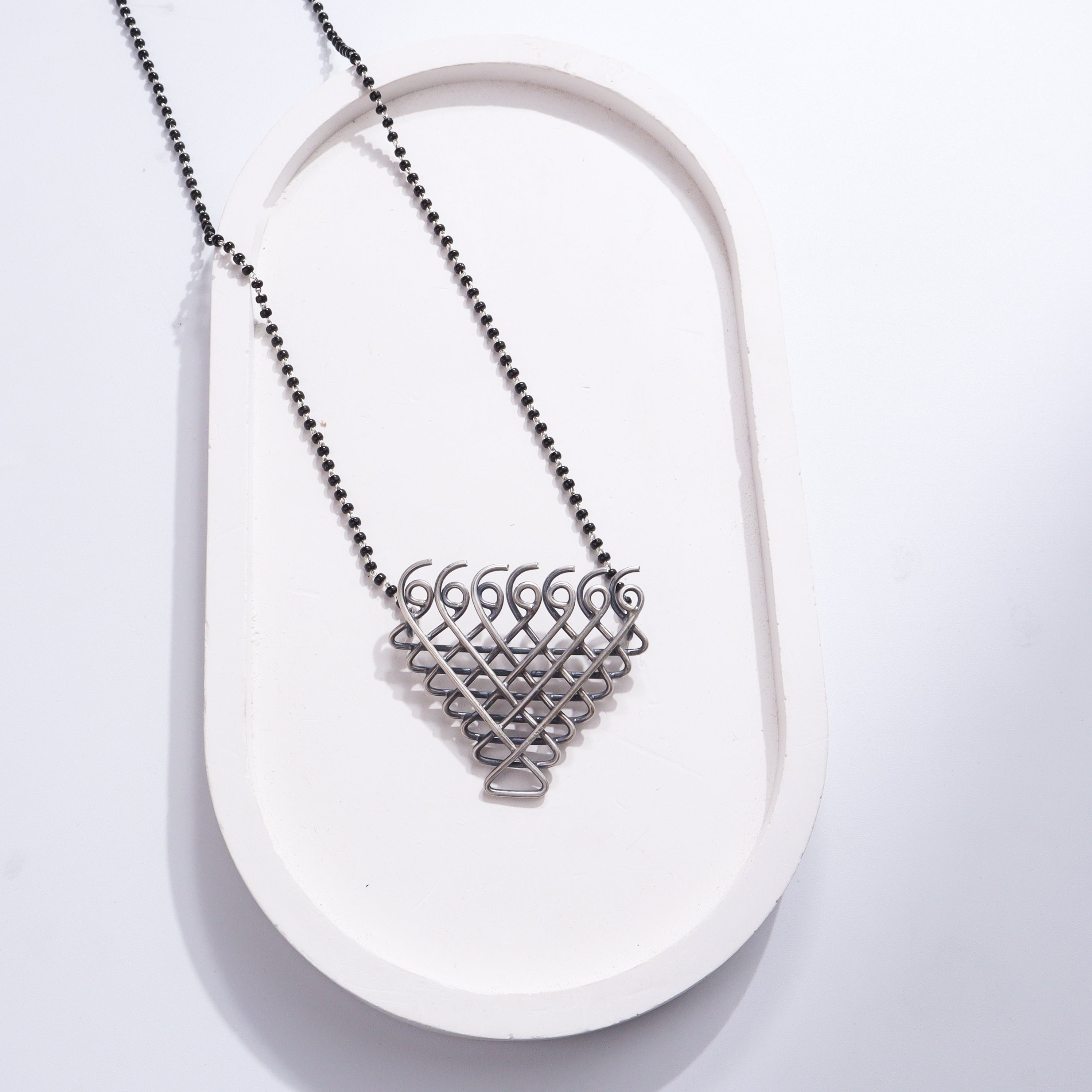 Silver Saraswati Mangalsutra with black beads and intricate pendant