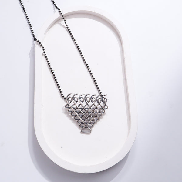 Silver Saraswati Mangalsutra with black beads and intricate pendant