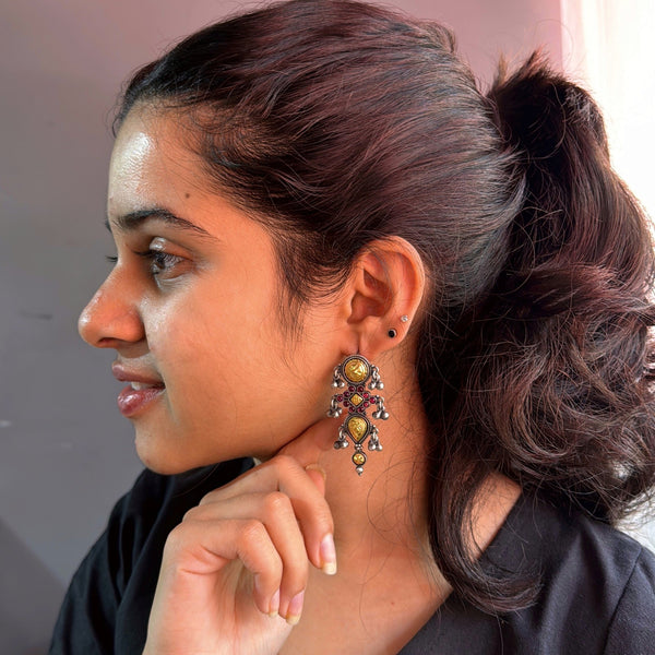 Elegant traditional earrings with gold and silver accents