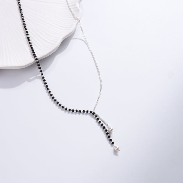 Silver and pearl necklace