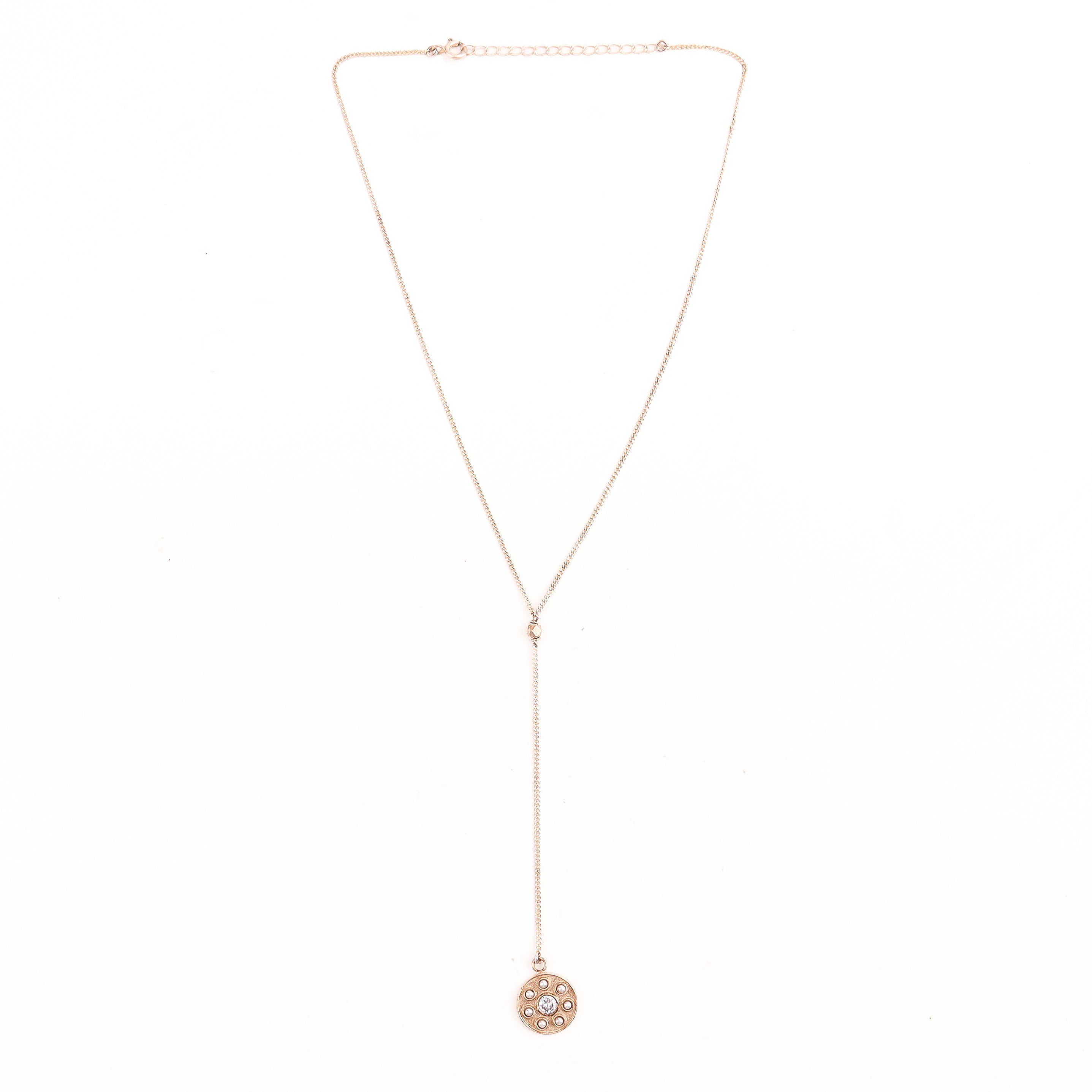 Silver Y necklace styled with V-neck dress
