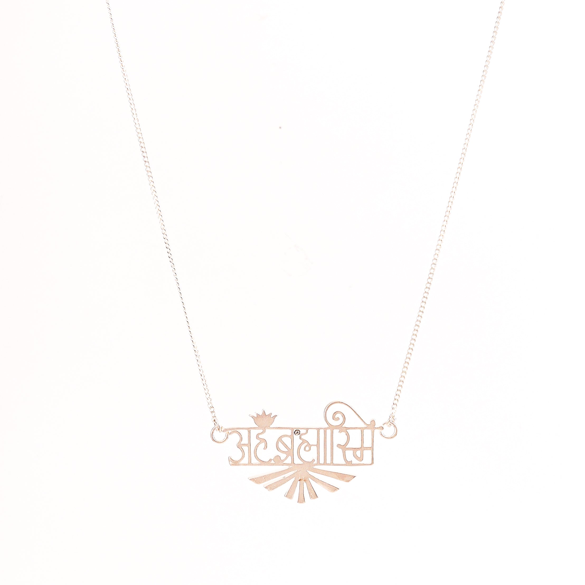 Ahambrahmasmi silver necklace styled with contemporary outfit