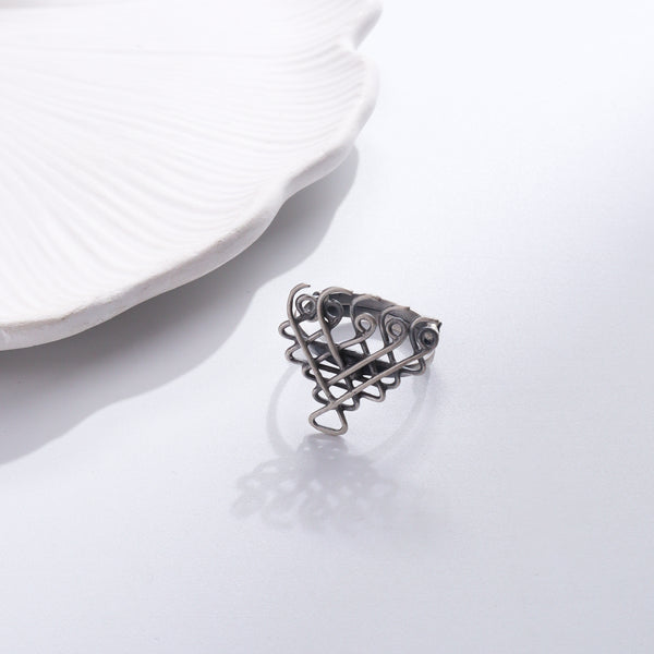 Silver Saraswati Ring small motif on white background