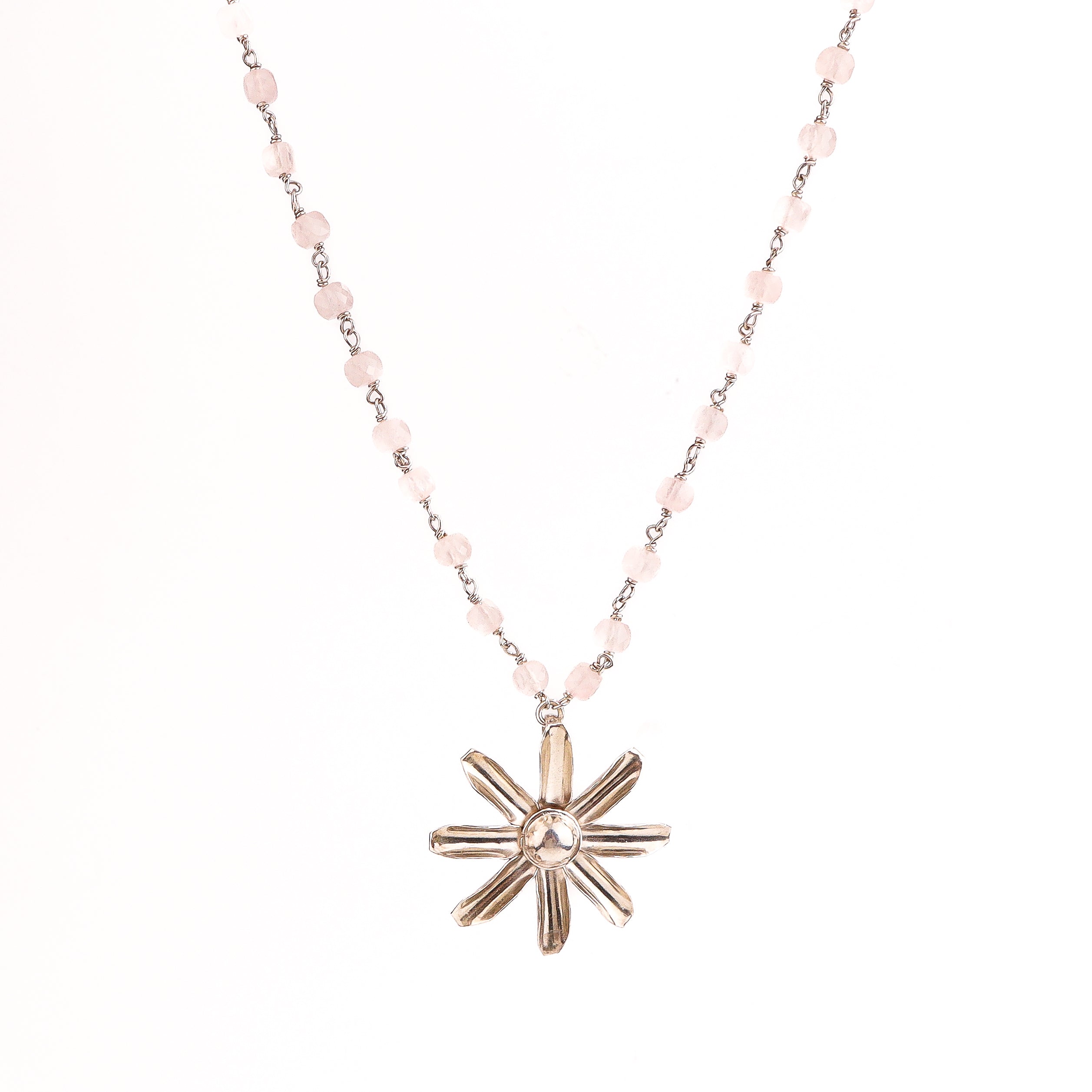 Detail shot of rose quartz setting in Gulbahaar Necklace