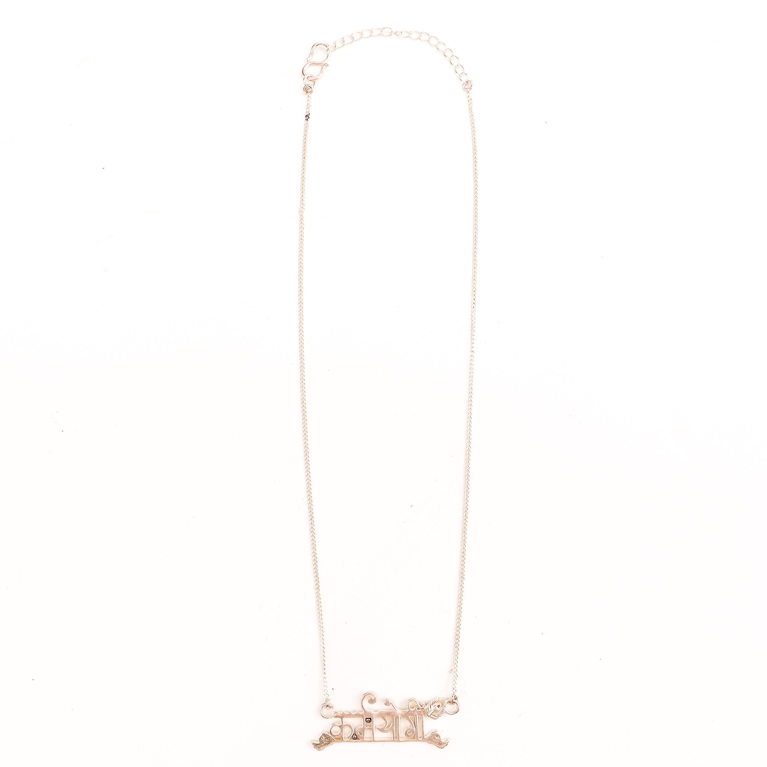 Detail shot highlighting precision-cut lettering and silver finish