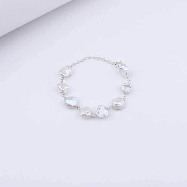 Baroque Pearl Ganthan Bracelet with irregular white pearls on silver chain