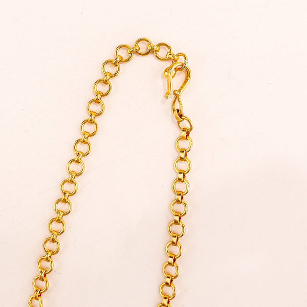 Macro detail of lotus petals and textured 22K gold plated surface on sterling silver armband