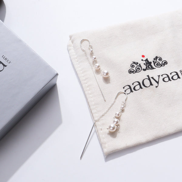 Pearl earrings with silver chain and pin design for women