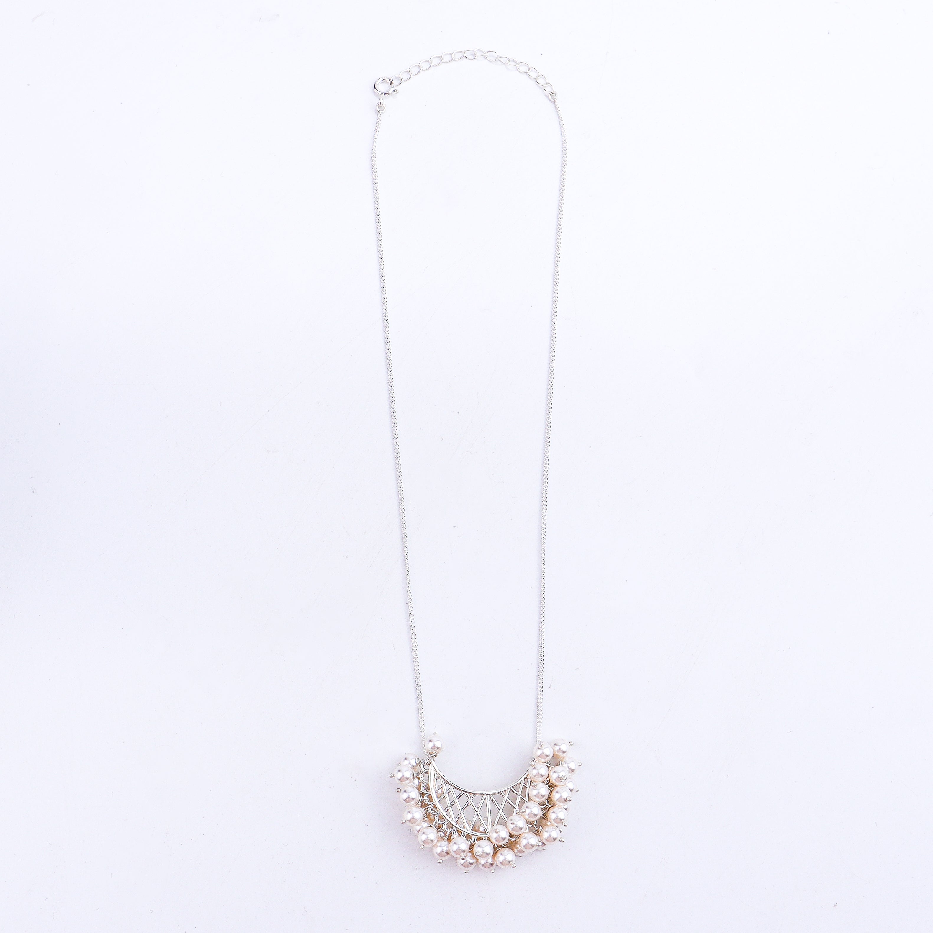 chand filigree detailing and pearl accents