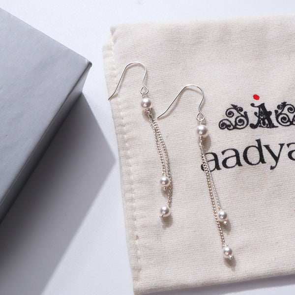 Elegant pearl dangler earrings with silver chains for women