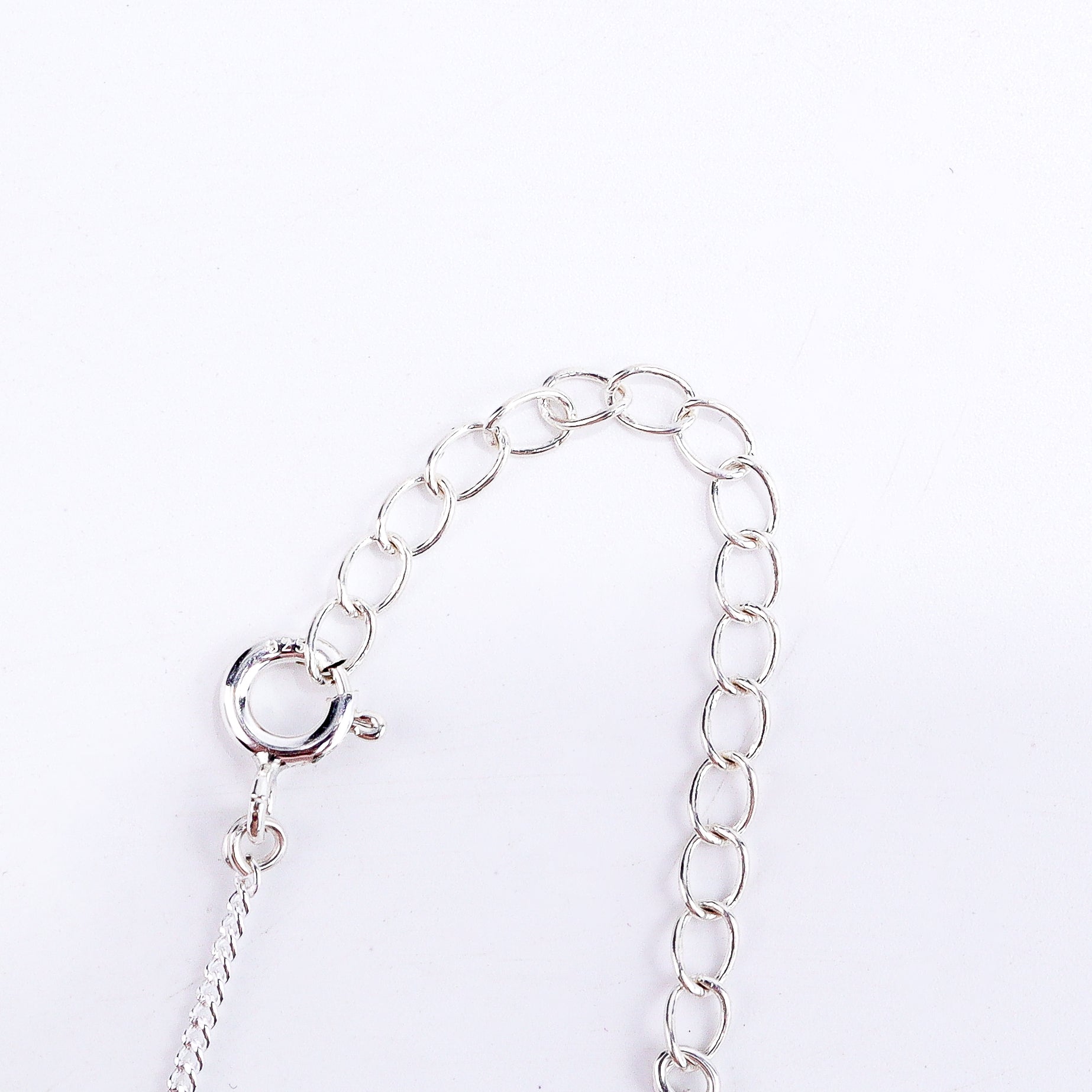 Lotus silver necklace styled with modern outfit