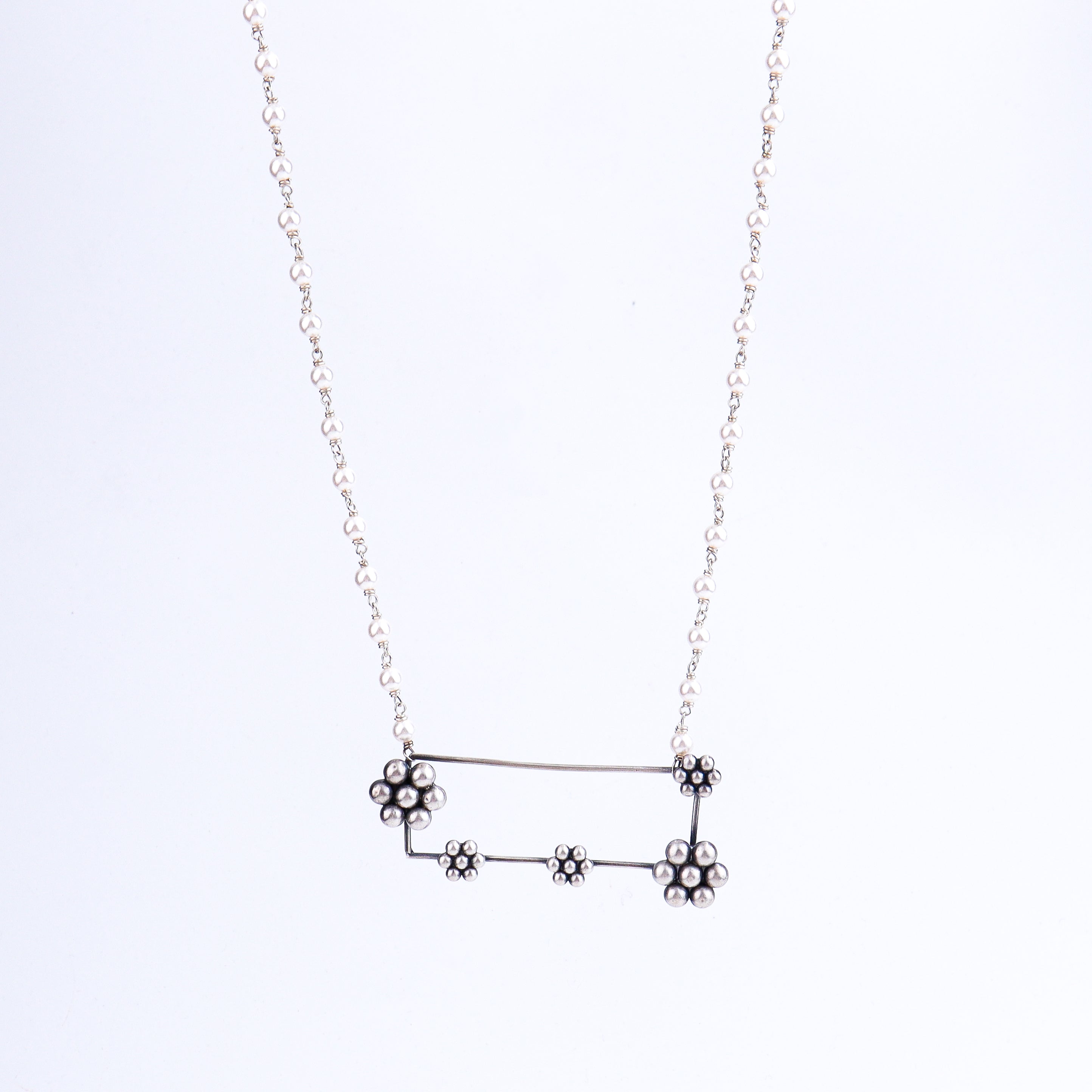 Kudi abstract pearl necklace styled with saree and Indo-western outfit