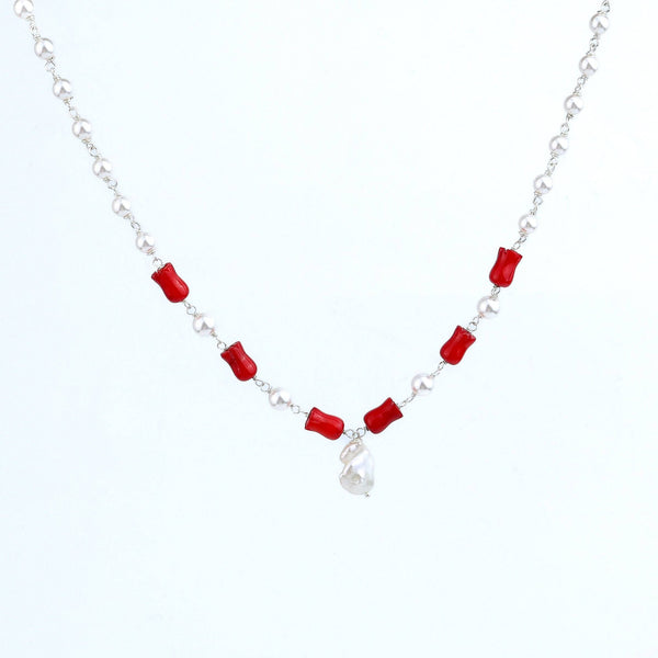 Model wearing pearl Ganthan necklace with semiprecious stones for festive or wedding styling