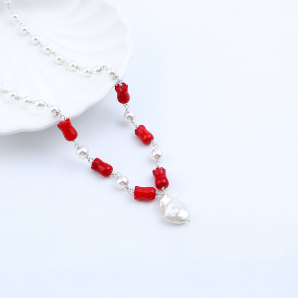Macro detail of lustrous pearls and polished semiprecious stones on 92.5 sterling silver Ganthan necklace