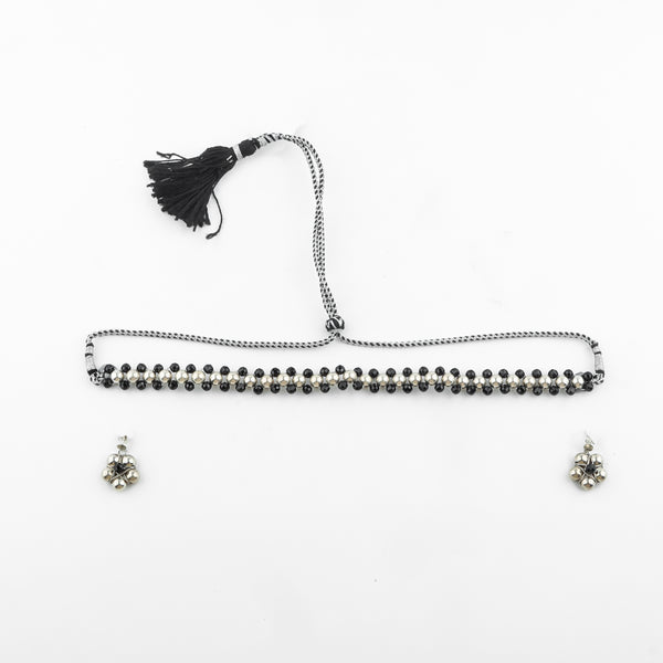 Model wearing Silver Bead Thushi Set with Black Spinel
