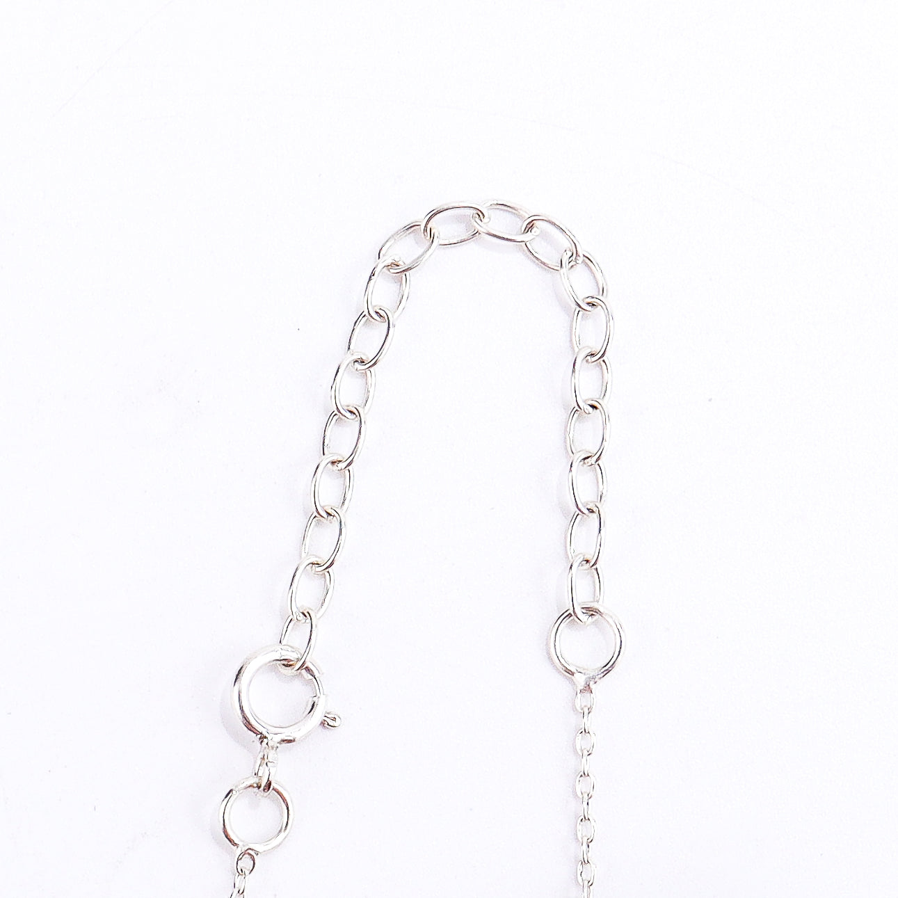 Mother pendant silver necklace styled with modern outfit
