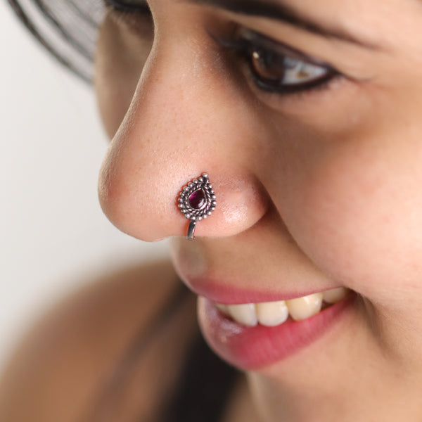 Pink stone silver clip on nose pin detailing
