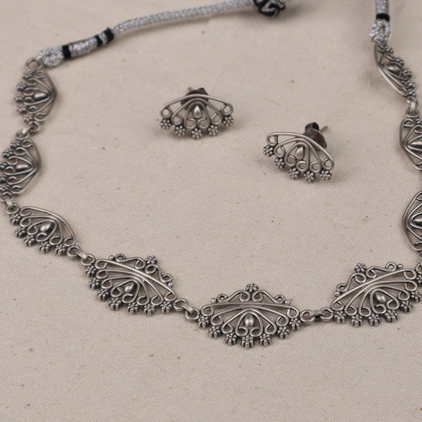 Silver jewelry set with matching necklace and earrings
