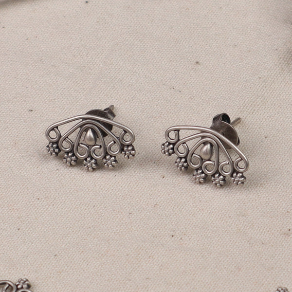 Silver Padma Nakshi earrings with floral motifs