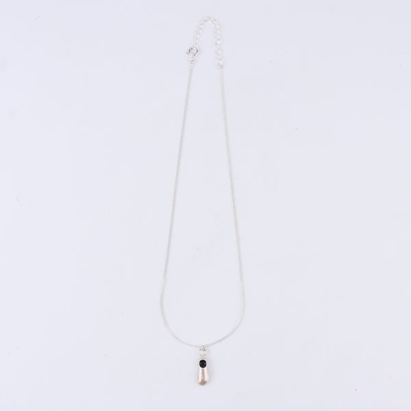 Flat-lay shoe pendant necklace