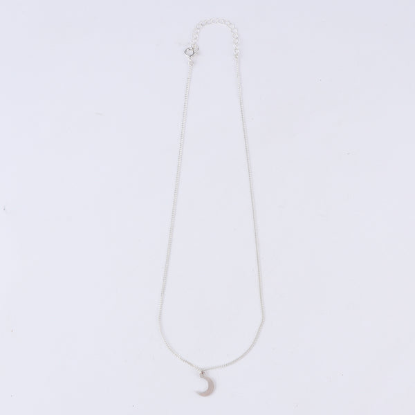 Flat-lay moon pendant necklace