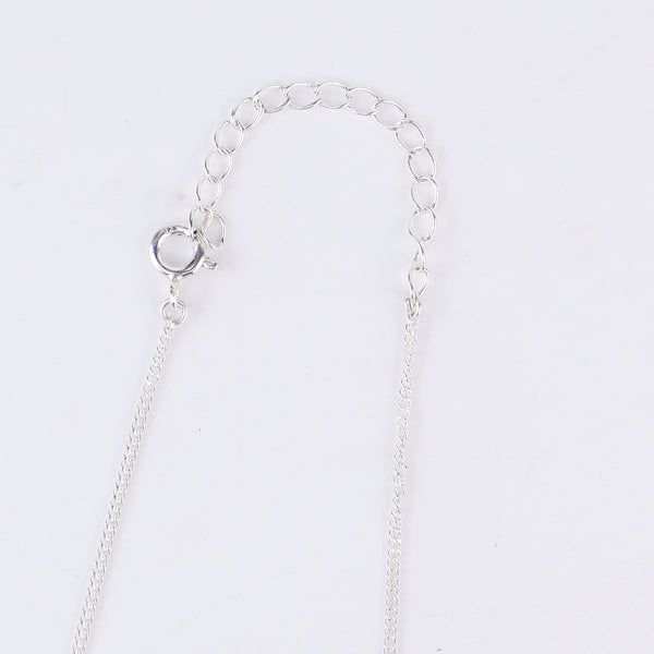 Moon silver pendant styled with dress and modern outfit